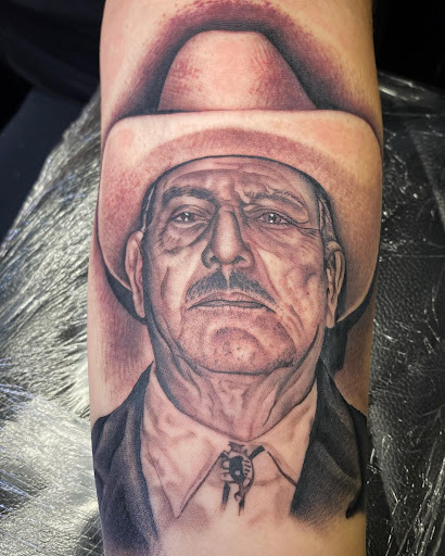 Explore armband tattoo ideas for men, creative tattoo ideas in San Diego, available at Hustle Tattoo & Piercing Studio