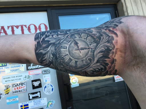 Explore memorial portrait tattoo ideas, creative tattoo ideas in Green Bay, available at Darkside Tattoo By Jesse Skywalker