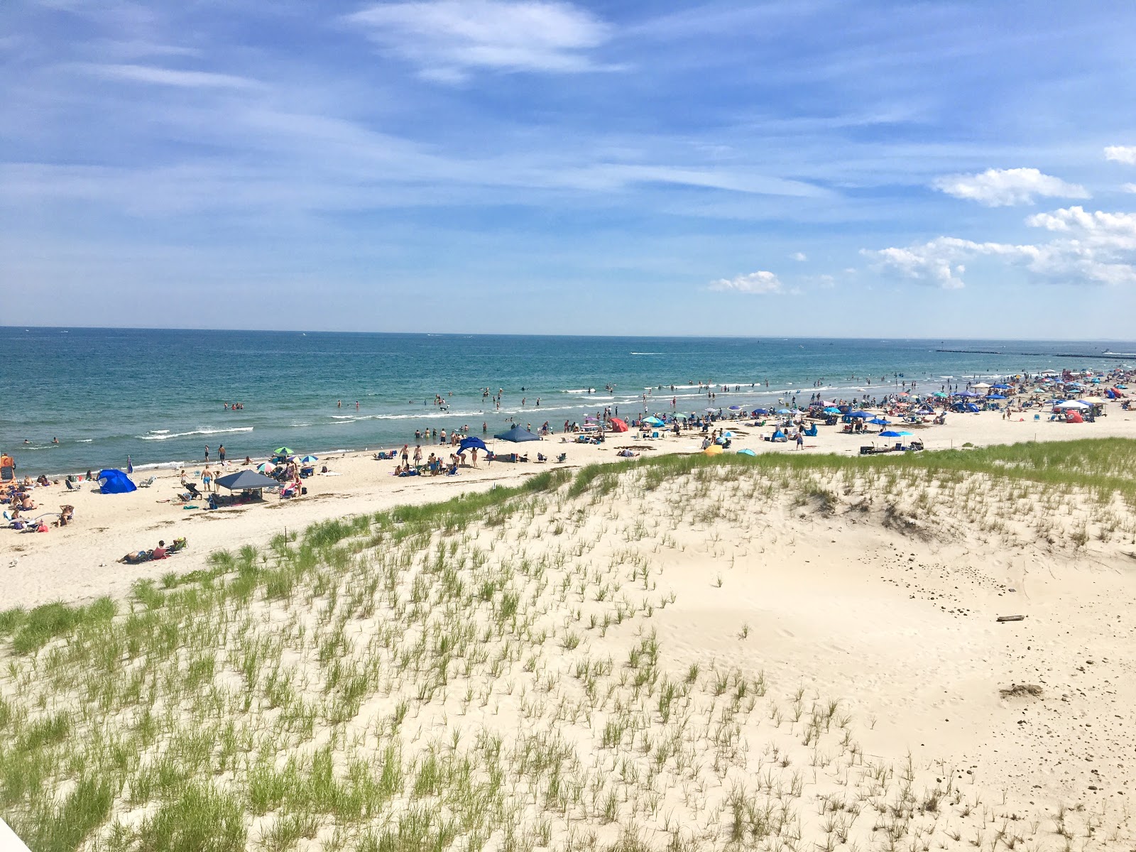 Photo de Hampton beach avec sable fin et lumineux de surface