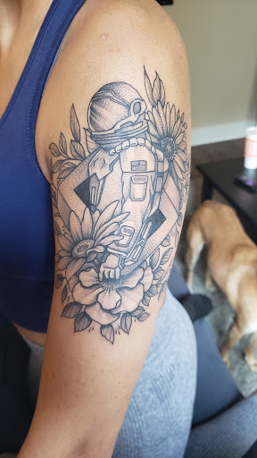 Explore chandelier tattoo ideas, creative tattoo ideas in Arlington, available at Urbans Tattoo & Piercing Studio