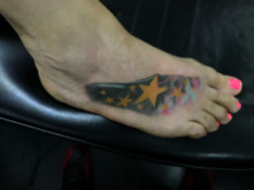 Explore bad bunny tattoos ideas, creative tattoo ideas in Panama City Beach, available at Revolution Tattoo & Body Piercing