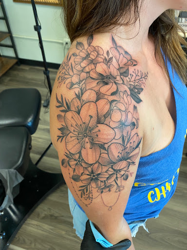 Explore feminine cover up tattoo ideas, creative tattoo ideas in Roseville, available at Ravens Mark Body Art Collective Tattoos & Piercings