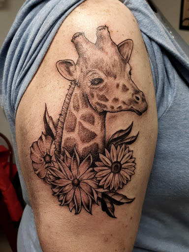 Explore rosary tattoo ideas, creative tattoo ideas in Marietta, available at Monkeys Uncle Tattoo