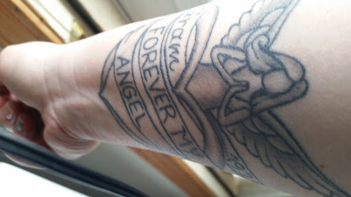 Explore matching father and son tattoo ideas, creative tattoo ideas in Montgomery, available at 2Tone Tattoo