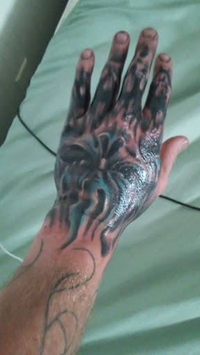 Explore tattoos on hand ideas, creative tattoo ideas in Hastings, available at Black Diamond Tattoo