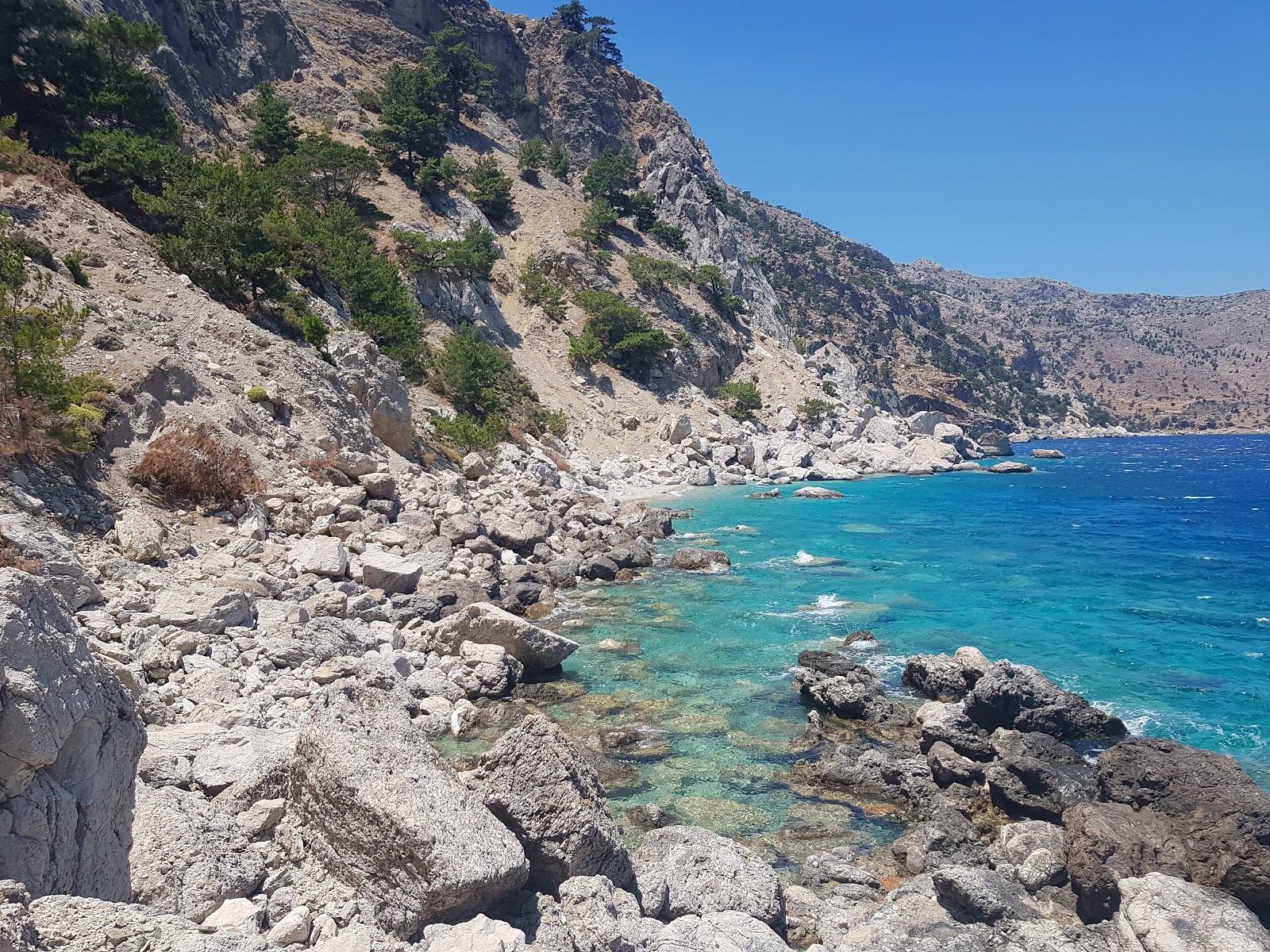 Foto van Evangeline beach gelegen in een natuurlijk gebied