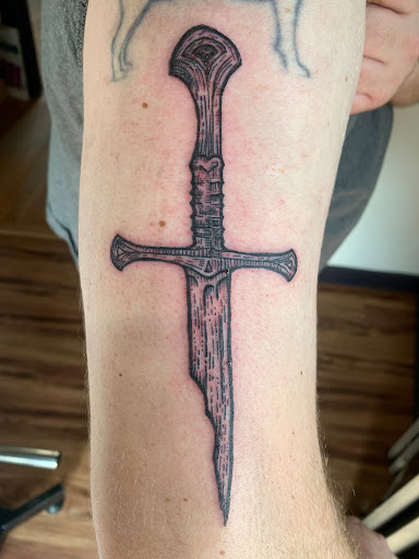 Explore hood tattoo ideas for men, creative tattoo ideas in Barre, available at HINTERLAND TATTOO