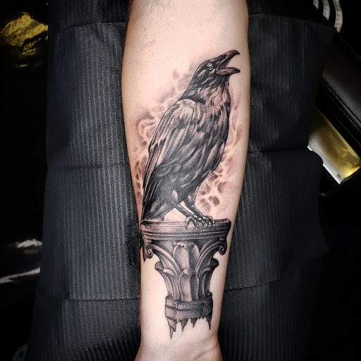 Explore spine tattoo ideas for females, creative tattoo ideas in Hagerstown, available at Tomahawk Tattoo MD