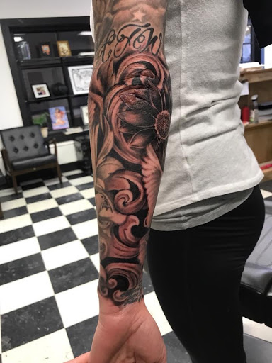 Find tattoo ideas for leg for your next unique tattoo in New Cumberland at American Anchor Tattoo Co.