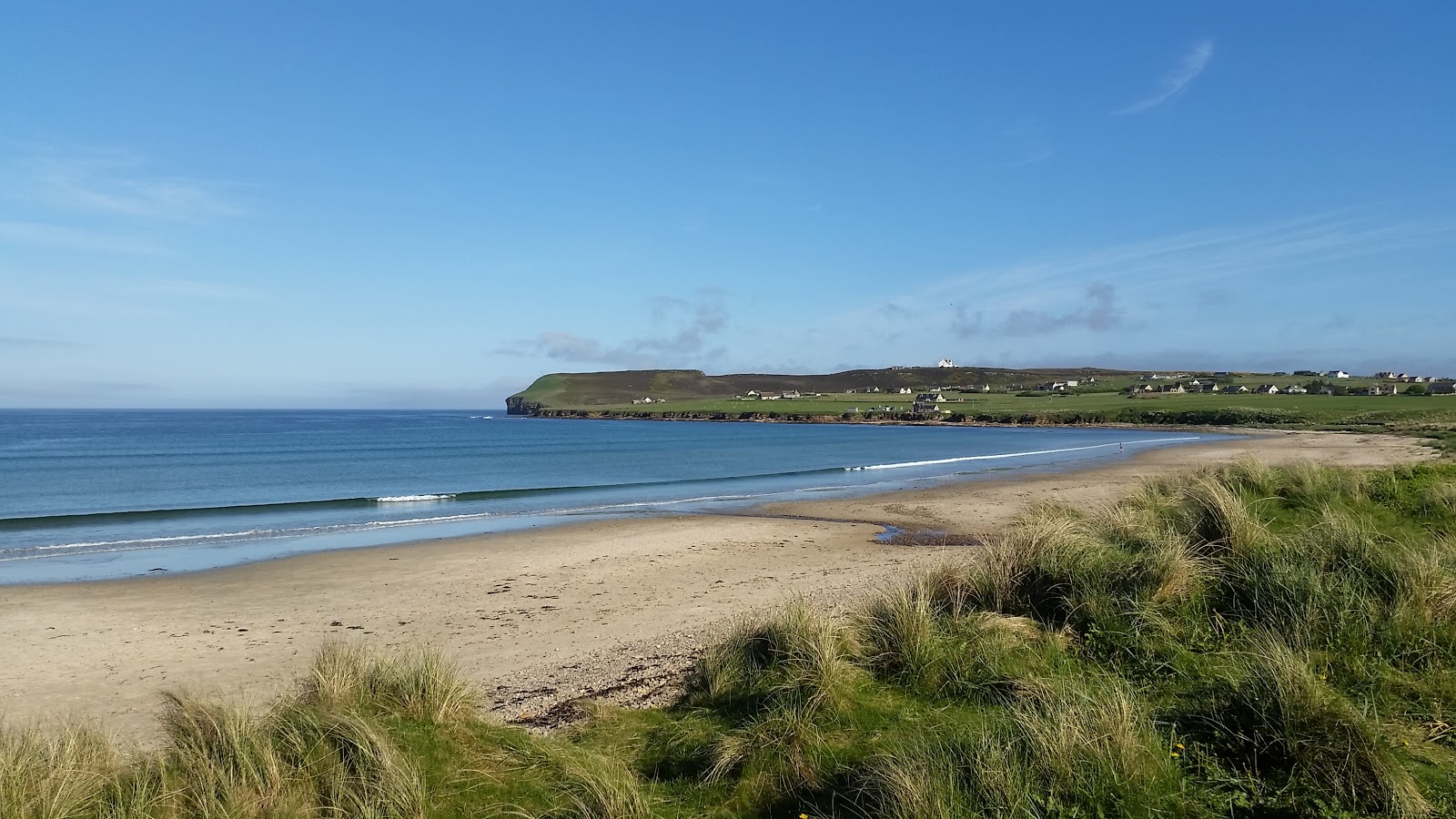 Photo of Dunnet Beach with bright sand surface