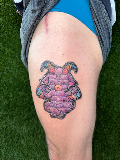 Explore daisy flower tattoo ideas, creative tattoo ideas in Cocoa, available at Rorschach Tattoo Shop and Piercing Studio