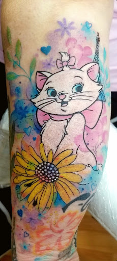 Explore vine tattoo ideas for females, creative tattoo ideas in Benton, available at Spectrum Tattoo