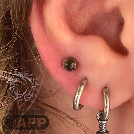 Explore 2 inch by 2 inch tattoo ideas, creative tattoo ideas in Appleton, available at Celestial Piercing- Inside of Big Guns Tattoo