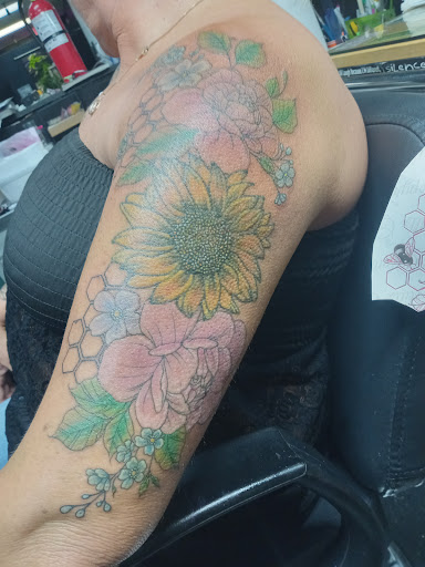 Explore mother of 4 tattoo ideas, creative tattoo ideas in Hamilton, available at A New Part of You Tattoos and Piercings