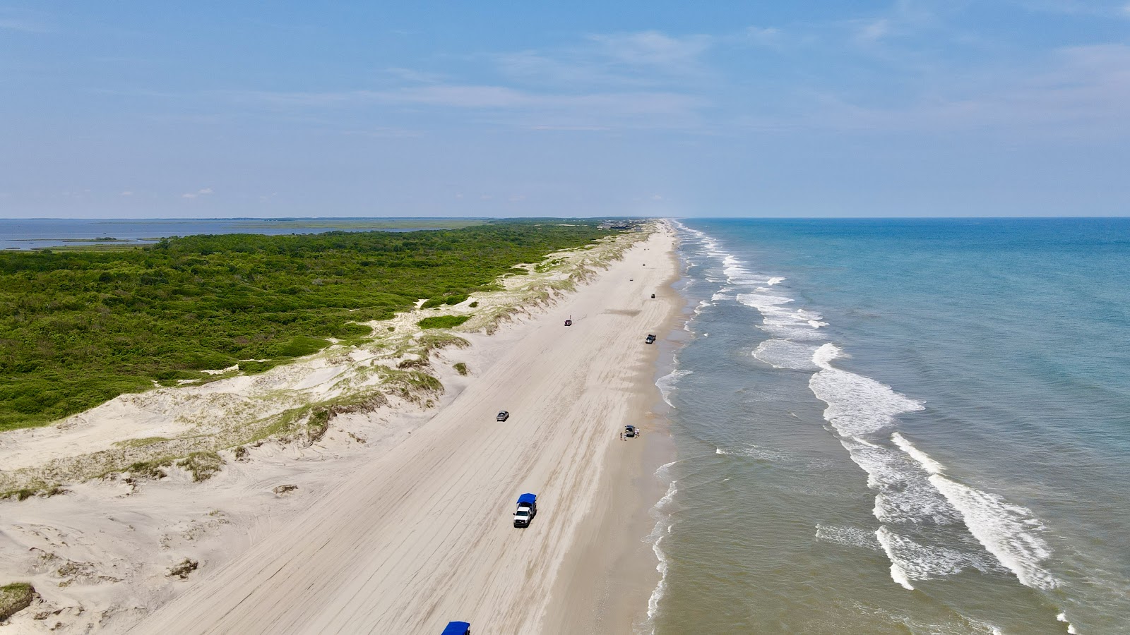Foto van Corolla beach II met helder zand oppervlakte