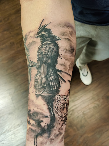 Explore praying mantis tattoo ideas, creative tattoo ideas in Tahlequah, available at Monochrome Ink