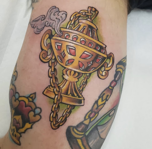 Explore halloween tattoo ideas for men, creative tattoo ideas in New Orleans, available at Downtown Tattoos and Piercing