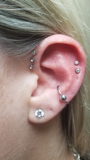 Explore sadness tattoo ideas, creative tattoo ideas in Coral Springs, available at The Levi & Lili Tattoo Company