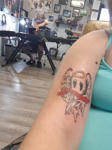 Find tattoo ideas on leg for your next unique tattoo in Clearfield at Frankies Tattoo Parlor