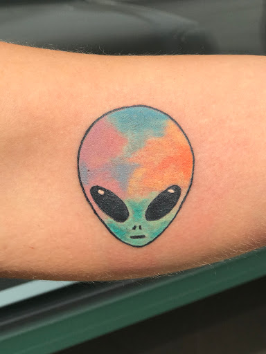 Explore feminine neck tattoo ideas, creative tattoo ideas in Frankfort, available at The Reef Tattoo