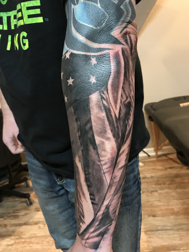 Explore brown pride tattoo ideas, creative tattoo ideas in Forney, available at Supernatural Tattoo Studio