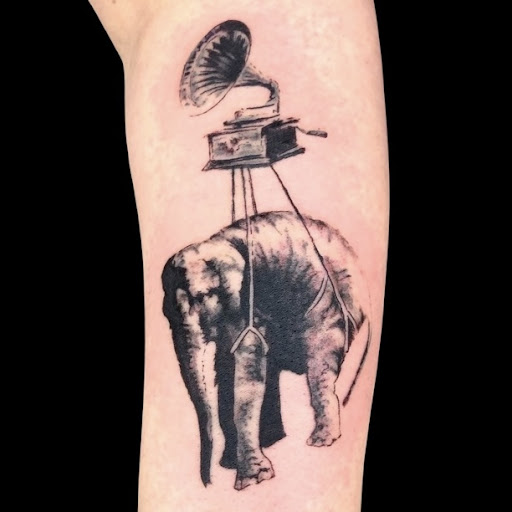 Explore bottom leg tattoo ideas, creative tattoo ideas in Charlotte, available at Canvas Tattoo & Art Gallery
