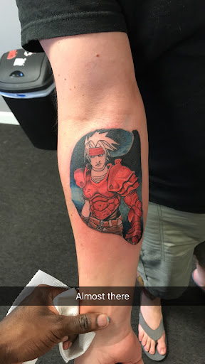 Explore flag tattoo ideas, creative tattoo ideas in Goose Creek, available at Red Kirin Tattoo