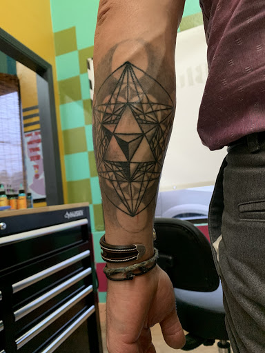 Explore hellscape battle sleeve tattoo ideas, creative tattoo ideas in Lincoln City, available at Black N Blue Tattoo & Skate Shop