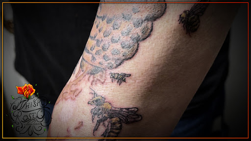 Explore breastfeeding tattoo ideas, creative tattoo ideas in Minocqua, available at Whisky Rose Tattoo Parlor