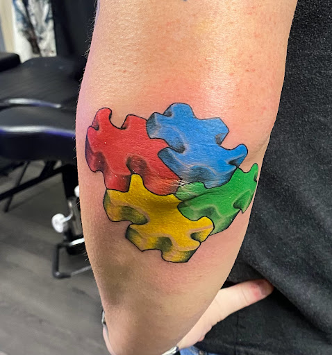 Explore pansy tattoo ideas, creative tattoo ideas in Concord, available at Ink and Iron LLC