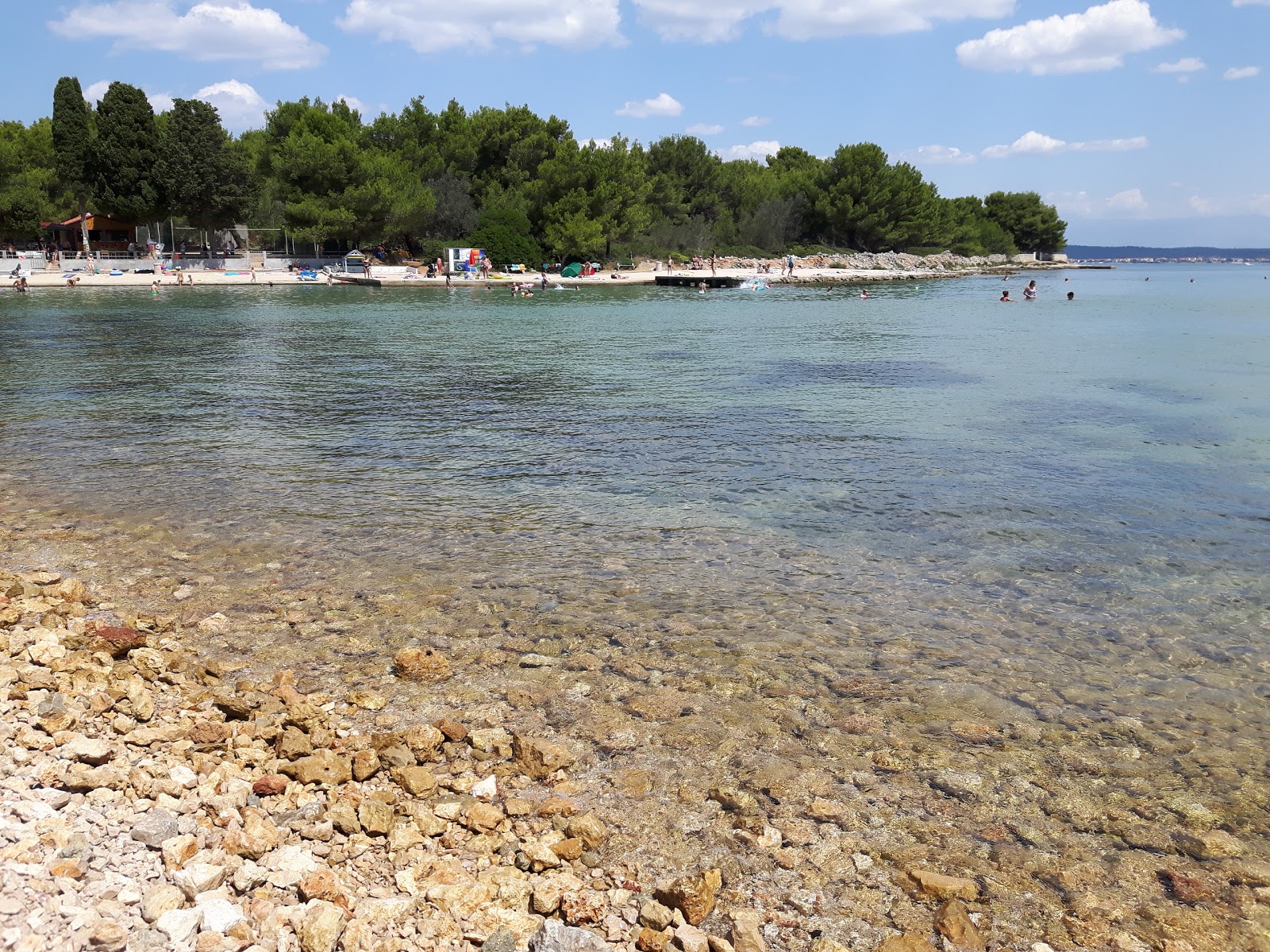 Photo of Matlovac beach with green pure water surface