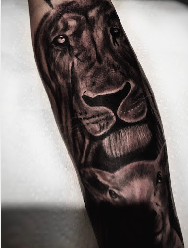 Explore dog tag tattoo ideas, creative tattoo ideas in Lavonia, available at 1890 Tattoo Co.