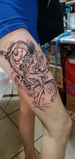 Explore doom tattoo ideas, creative tattoo ideas in Englewood, available at The Original Big Daddy Tattoo & Body Piercing est.1997 est.1997