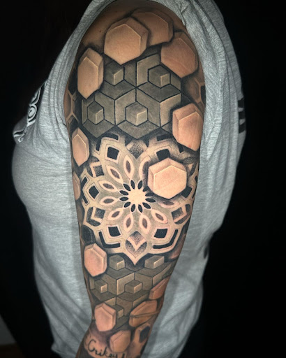 Explore thigh tattoo ideas for women, creative tattoo ideas in Prescott, available at BlackGold Tattoo