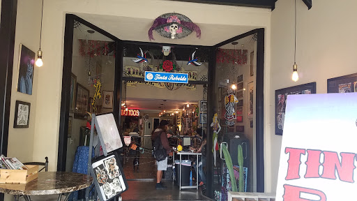 Explore mens back tattoos ideas, creative tattoo ideas in Los Angeles, available at Tinta Rebelde hardcore tattoo