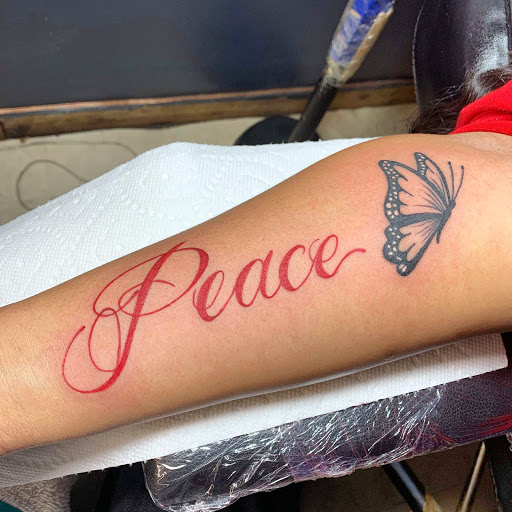 Explore waylon jennings tattoo ideas, creative tattoo ideas in Midland City, available at Tattoo shop woodwerks got ink