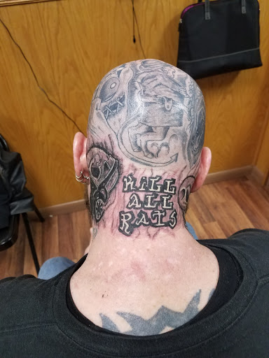 Explore front neck tattoo ideas, creative tattoo ideas in Hudson Falls, available at ALTERED ADDICTION TATTOOS