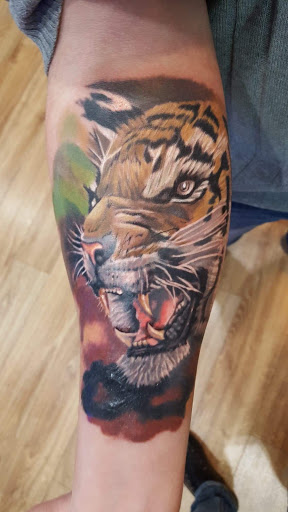 Explore tattoo ideas for belly, creative tattoo ideas in New York, available at Redink Tattoo Studio