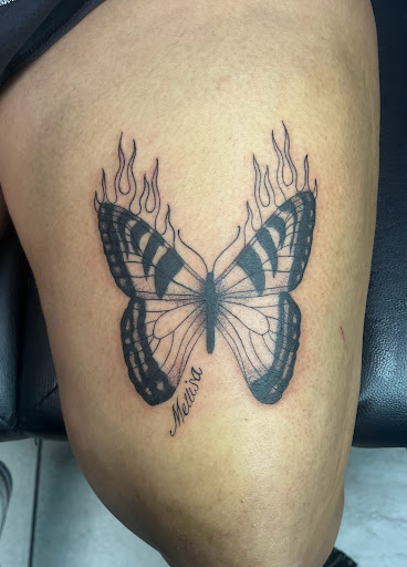 Explore leg tattoo idea for men, creative tattoo ideas in Foley, available at Symbolic Ink Tattoo Studio