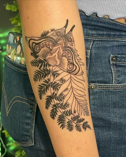 Explore black power tattoo ideas, creative tattoo ideas in Modesto, available at Dying Art Tattoo