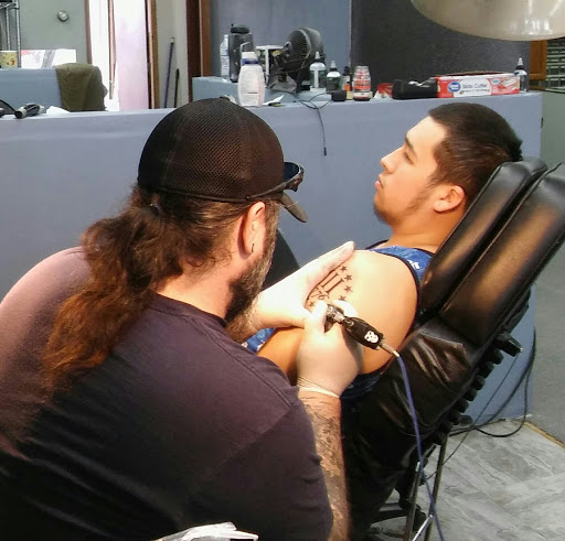 Explore grandkids names tattoo ideas, creative tattoo ideas in Monroe, available at Hardline Tattoo