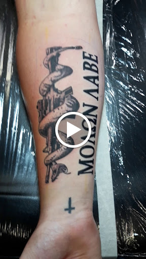 Explore miami dolphins tattoo ideas, creative tattoo ideas in Saint Petersburg, available at Ink Godz Tattoos