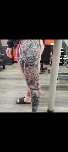 Explore tattoo cover up ideas on leg, creative tattoo ideas in West Bend, available at Frenchys Tattoos & Co LLC