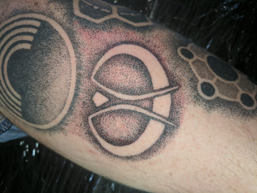 Explore black heart heart tattoo cover up ideas, creative tattoo ideas in Fremont, available at Inkies Tattoo Studio