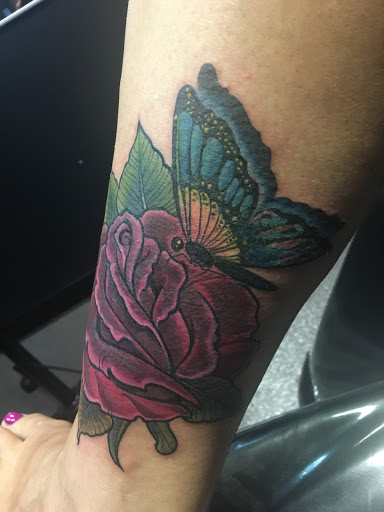 Explore red ink tattoo ideas, creative tattoo ideas in Cleveland, available at True Art Tattoos, Inc
