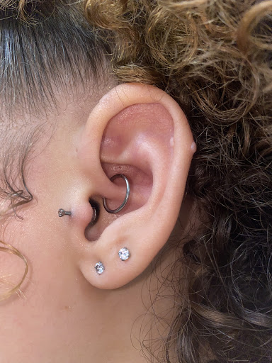 Explore matching tattoos for father and son ideas, creative tattoo ideas in Columbia, available at RAW Body Piercing Two Notch