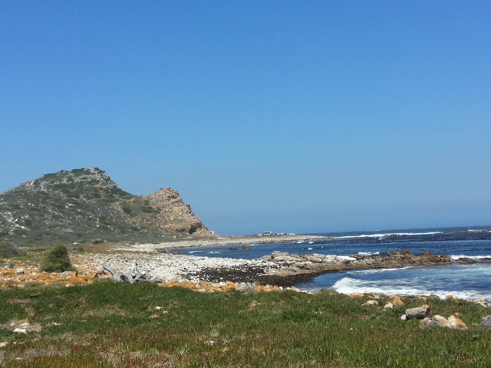 Photo of Maclear beach with blue pure water surface