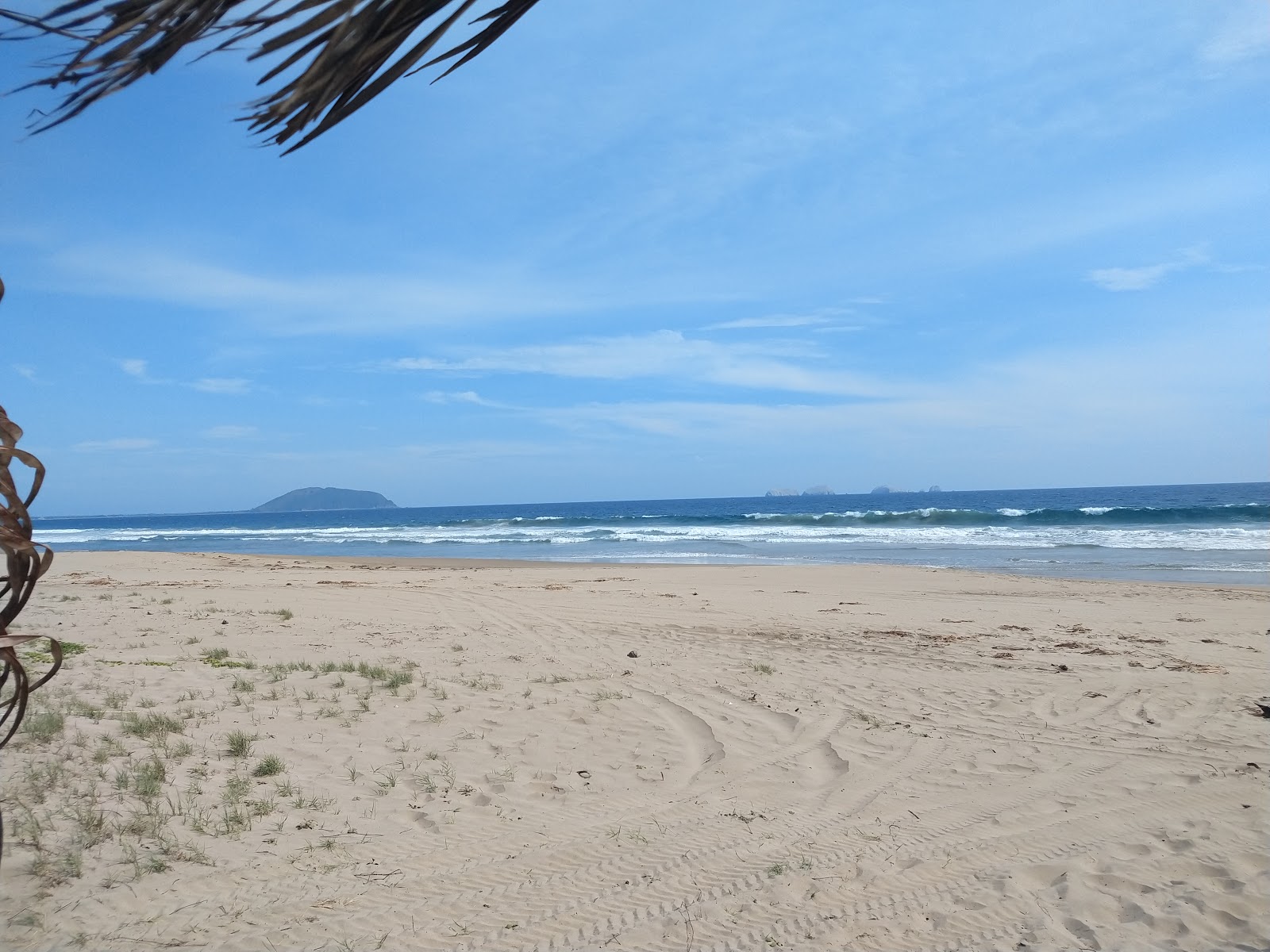 Foto van Playa Blanca met turquoise water oppervlakte