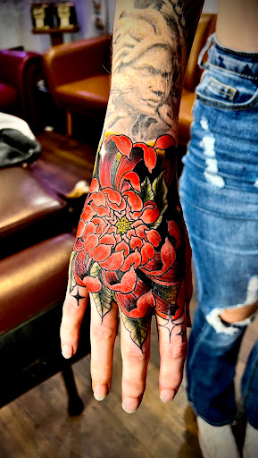 Explore ear tattoo ideas, creative tattoo ideas in Danville, available at BarbedWire Ink Tattoos