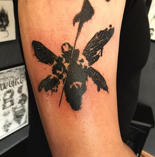 Explore female leg tattoo ideas, creative tattoo ideas in Milwaukee, available at Bay Street Tattoo Co.